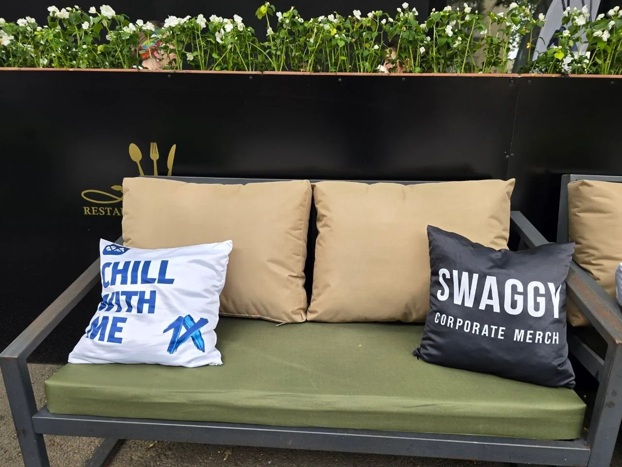 Branded cushions integrated into an event lounge