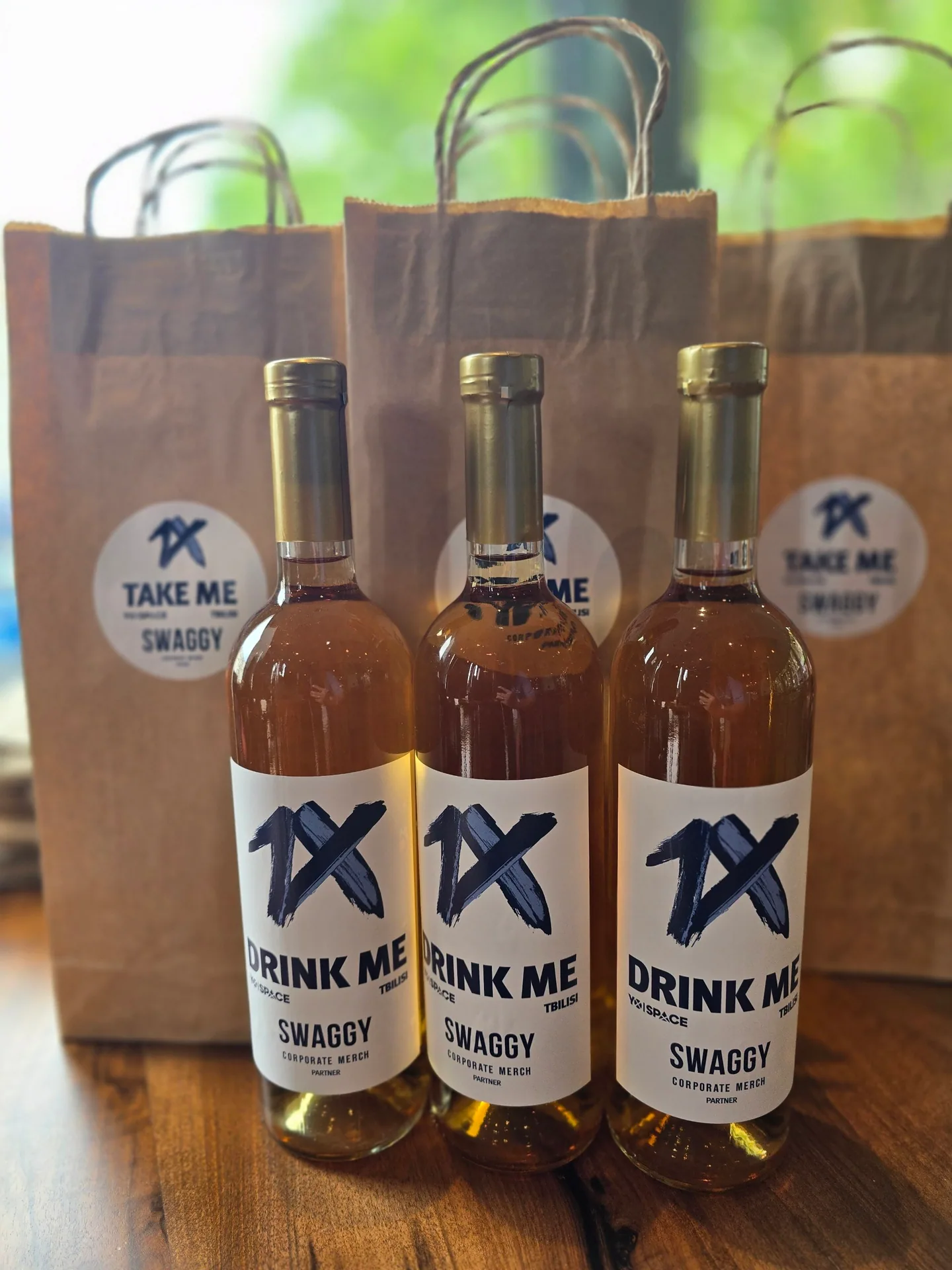 Custom-labelled Georgian wine prepared as event gifts