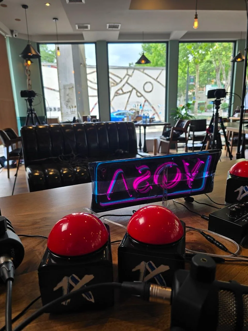 Microphones and cameras prepared for a corporate event