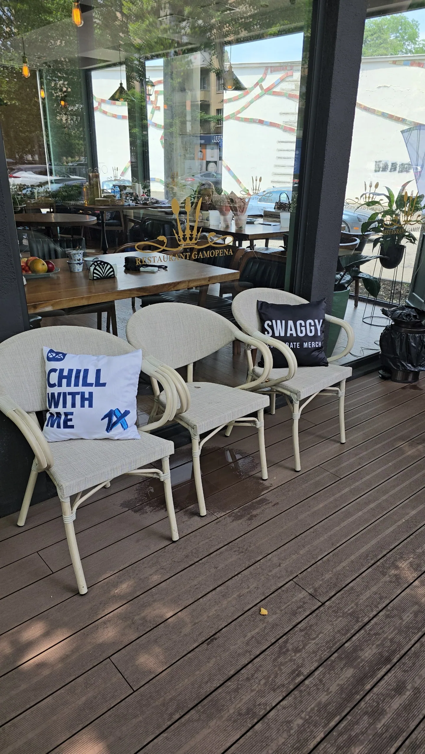 Terrace seating with custom event branding at a Tbilisi venue